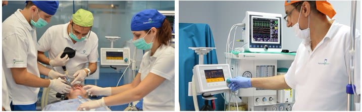 Echipa medicală pregătind pacientul pentru anestezie generală și medicul anestezist la aparatul de anestezie