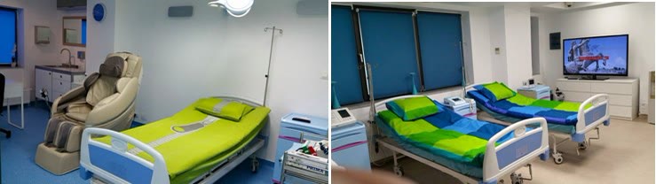 Camere de recuperare din clinică, cu paturi și fotoliu de relaxare pentru pacienții operați