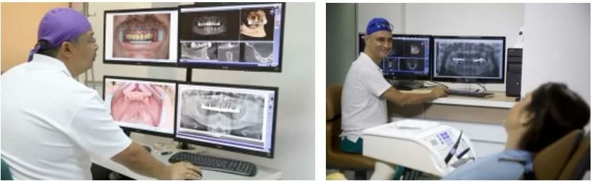 Analiza digitală a investigațiilor: medicul studiază fotografiile clinice, radiografia panoramică și secțiunile de tomografie pe monitoarele din clinică