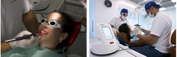 Tratamentul cariei cu laser la o pacientă echipată cu ochelari de protecție și unitatea de laser terapeutic folosită în cabinet